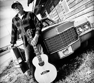 Kevin Brown, guitar and Cadillac